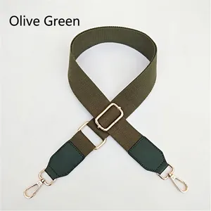 Tracolla regolabile in cotone verde militare con terminali in pelle e fibbie oro