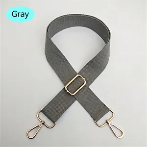Adjustable grey cotton shoulder strap with golden metal lobster clasps for handbags
