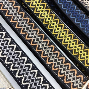 Detailed close-up of woven jacquard replacement bag straps with ethnic geometric patterns