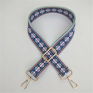 Ethnic geometric pattern bag strap with gold metal hooks and adjustable buckle design