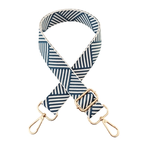 Close-up of 3.8cm blue and white geometric woven strap with gold metal buckle