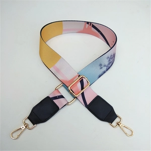 Adjustable wide replacement bag strap with ethnic colorful geometric pattern and gold clips