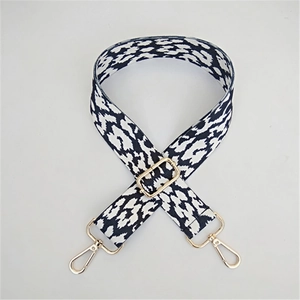 Adjustable wide black and white leopard print bag strap with gold metal lobster clasps
