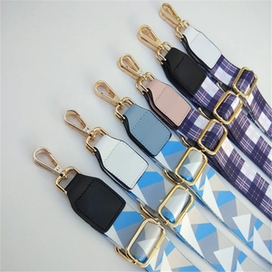 Adjustable wide ethnic style shoulder straps with colorful geometric patterns and gold hooks