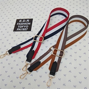 Adjustable striped canvas shoulder strap for crossbody bags with gold metal hardware