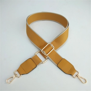 Adjustable mustard yellow wide shoulder strap with grey trim and gold lobster clasps