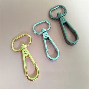 Three colors of durable swivel lobster clasps for adjustable shoulder bag straps