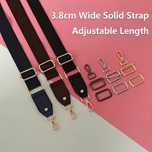 Adjustable 3.8cm wide nylon shoulder straps in navy, brown, and black with gold hardware