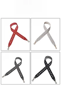 Wide colorful bag straps in red, beige, grey, and black with metallic eyelets and lobster clasps