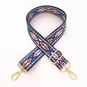 Ethnic style wide crossbody bag strap with blue and red geometric floral weave