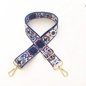 Ethnic blue floral wide crossbody bag strap with adjustable gold hardware