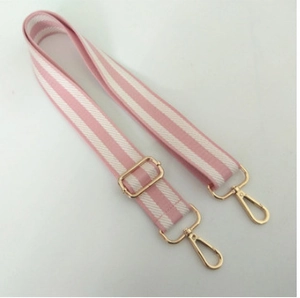 Adjustable pink and white striped shoulder strap with gold-tone hooks for handbags