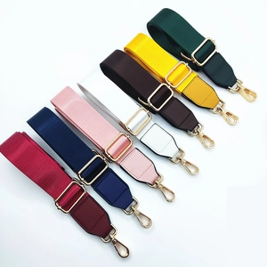 Adjustable nylon shoulder straps in multiple colors with gold metal hardware