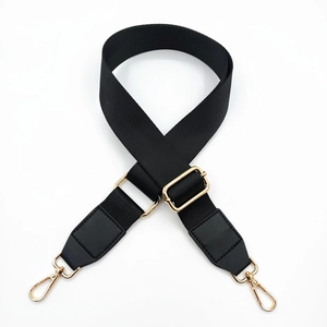 Black nylon shoulder strap with gold metal buckle and lobster clasp for messenger bags