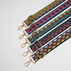 Ethnic style woven shoulder strap with geometric patterns and gold metal hooks