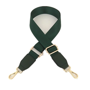 Adjustable dark green nylon bag strap with leather ends and gold metal buckles