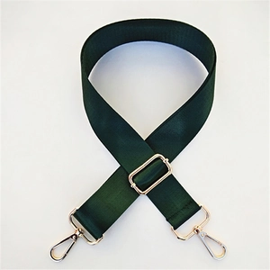 Adjustable dark green nylon shoulder strap with gold metal hooks for cross-body bags