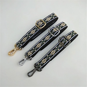 Adjustable ethnic style embroidered bag strap with gold, silver, and black hardware