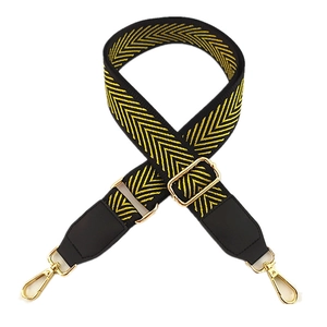 Adjustable wide replacement bag strap with yellow V-pattern and gold metal hooks