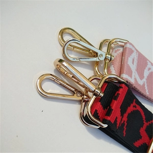 Adjustable wide jacquard shoulder strap with gold lobster clasps for crossbody bags