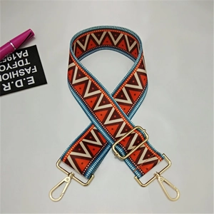 Adjustable wide shoulder strap featuring colorful geometric patterns and gold metal hooks