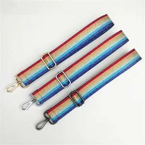 Close-up of 3.8cm wide rainbow glitter bag straps with gold, silver and gunmetal hooks