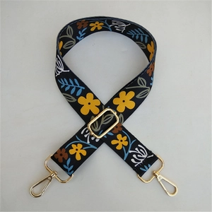 Ethnic style wide adjustable bag strap with colorful floral patterns and gold hardware
