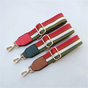 Three ethnic style adjustable wide bag straps with colorful stripes and gold metal hardware