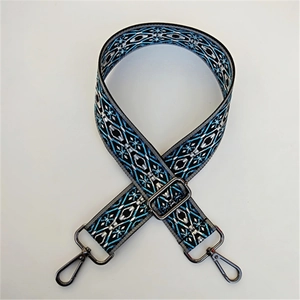 Ethnic style embroidered replacement strap with blue geometric patterns and metal hooks