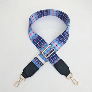 Adjustable colorful geometric shoulder strap with blue pattern and gold metal hooks