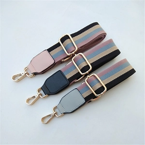 Adjustable woven replacement shoulder straps with gold hooks in colorful stripe designs