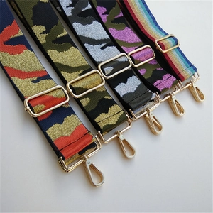 Close-up of camouflage and rainbow patterned 5cm wide replacement bag straps with gold hooks