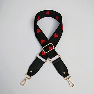 Adjustable black strap with red heart embroidery and gold metal hooks for women bags