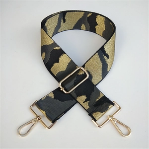 Detail of 5cm wide camouflage shoulder strap with premium gold adjustable hardware