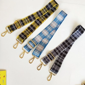 Adjustable canvas shoulder straps in tartan patterns with gold metal swivel hooks