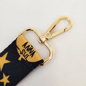 Adjustable navy wide strap with gold stars and spring clip for crossbody bags