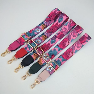 Floral bag straps with leather ends and gold metal buckles in five vibrant colors