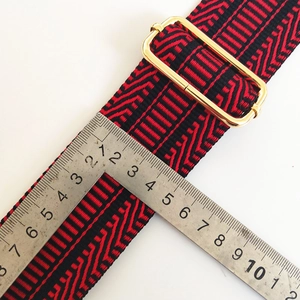 Adjustable 3.8cm wide red and black ethnic jacquard bag strap with gold buckle