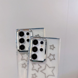 Detail of transparent phone case with silver frame and sparkling rhinestone star design