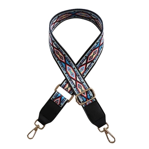 Ethnic wide adjustable bag strap with colorful geometric patterns and gold metal hooks