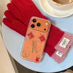 Detail of iPhone case featuring gold foil, lucky red pouches, and 3D festive ingots