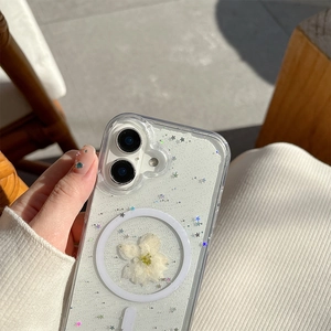 Clear glitter phone case with white dry flower and MagSafe ring for iPhone 17
