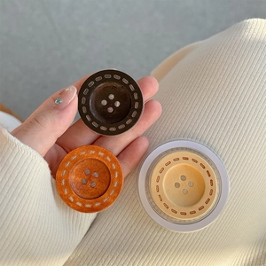Minimalist wood texture magnetic phone grip holder in brown, orange and yellow colors