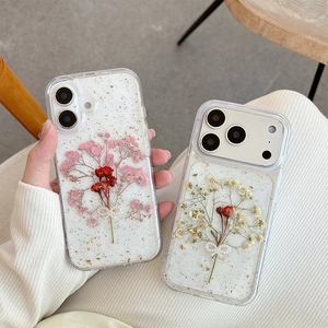 Clear floral iPhone case with real dried flowers, gold foil, and pearl bow accents