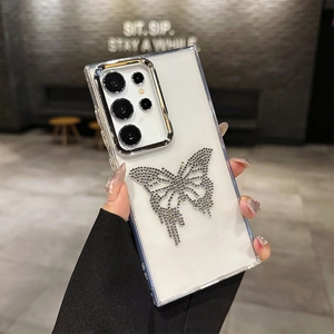 Luxury clear Samsung S25 Ultra case with silver camera frame and sparkling rhinestone butterfly