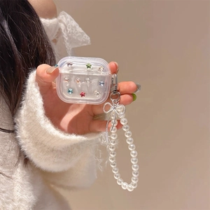Detail of clear AirPods Pro case with colorful star sequins and pearl wrist strap
