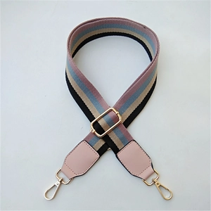 Adjustable wide replacement bag strap with pink, blue, and beige bohemian stripes