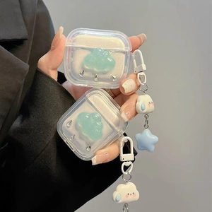 Clear glitter AirPods case with blue cloud and rhinestones, featuring star charm pendant
