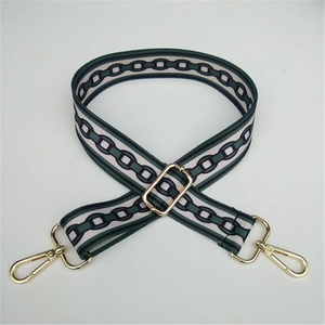 Adjustable wide fabric bag strap with green chain pattern and gold metal hardware