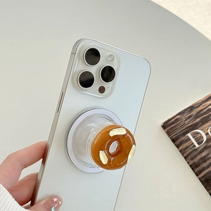 Minimalistische realistische 3D-Donut-Handyhalterung auf einem weißen Smartphone